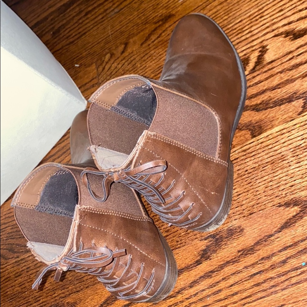 Brown Chelsea boots with lace up back